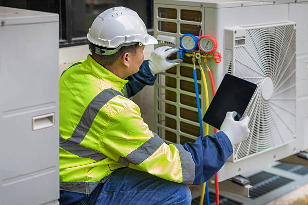Professional Hvac technician working in Auburn Hills, MI